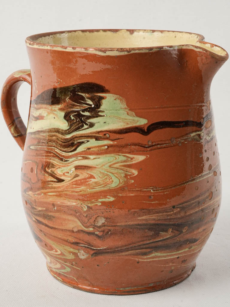 Antique glazed terracotta pitcher
